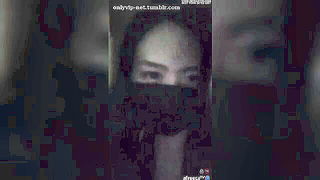 Masked Korean camgirl topless tease Asian sex movie still