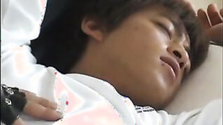 Asian gloved hand gripping KA-BAR dagger Asian sex movie still