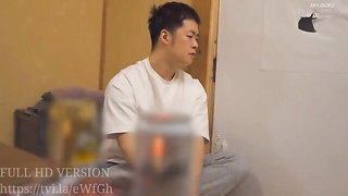 Couple filming themselves in an apartment bedroom