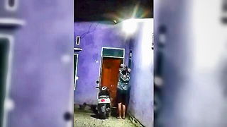 Indonesian neighbor voyeur at night Asian sex movie still