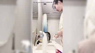Bathrobe Asian girl toothbrush closeup Asian sex scene screenshot