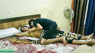 Couple filming themselves in an apartment bedroom